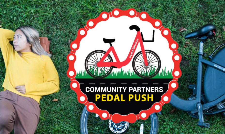 Woman laying next to bike, says "Community Partners Peddle Push"